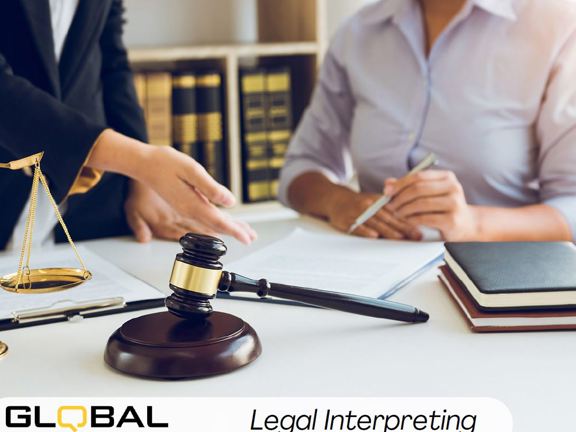 Two people at a table - one presenting documents to be signed and the other holding a pen about to sign. The table also have two note books, brass scales and gavel on it. Along the bottom it reads Global Language Services Legal Interpreting 