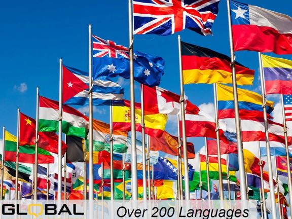 Many different country flags flapping in the wind on top of masts. Along the bottom reads Global Language Services over 200 languages.