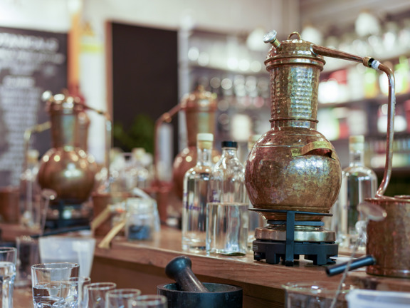 Mini distilling equipment, bottles and glasses