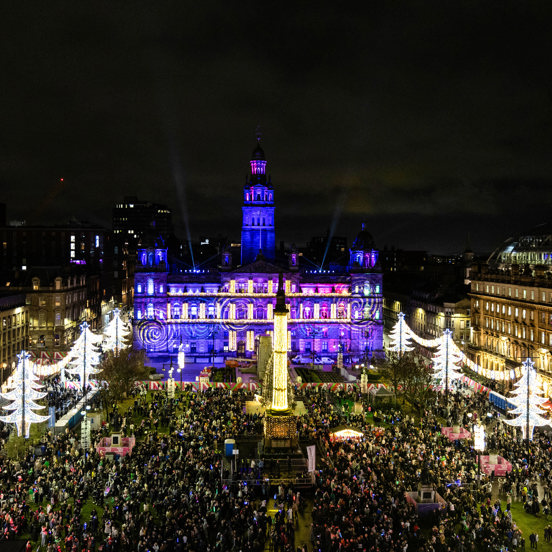 Christmas Lights Display of George Square with public on the square