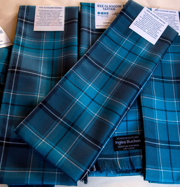 Blue toned tartan scarves and ties with IEEE Glasgow Tartan and  Ingles Buchan labels