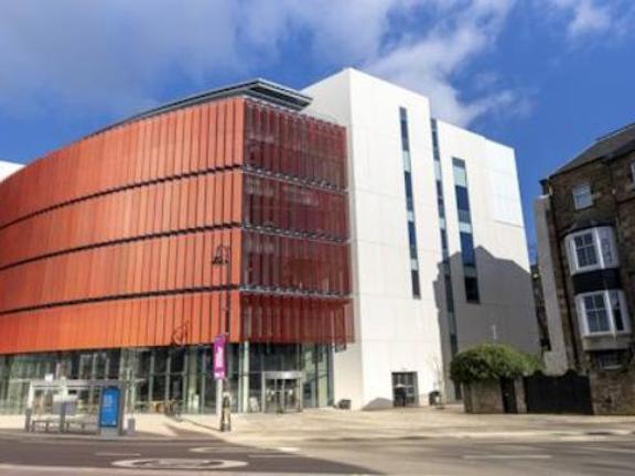 Modern metal and white concrete building - part of University of Glasgow campus called James McCune Smith building