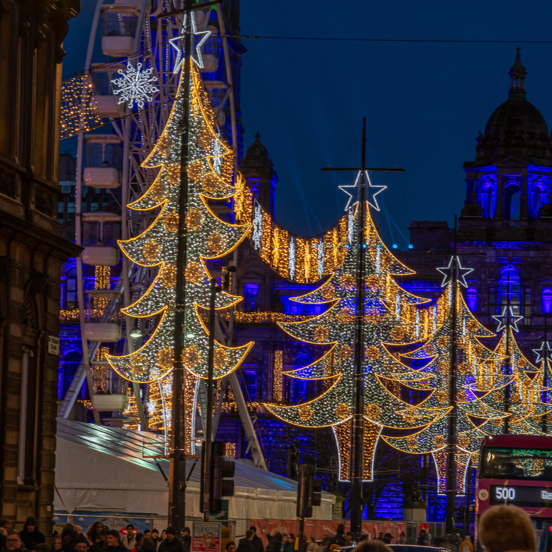 Christmas Lights Display at George Square of 5 Christmas tree lights in blue and yellow