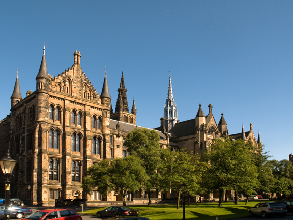 Main building of University of Glasgow - ornate stone building with large windows.