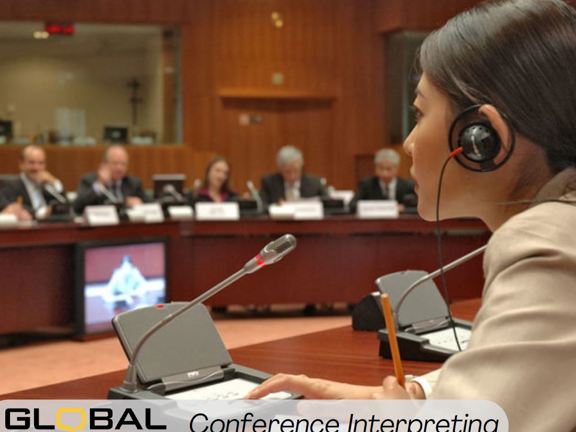 People seated around an oval table each with microphones and interpretation machines in front of them. Along the bottom reads Global Language Services Conference Interpreting 