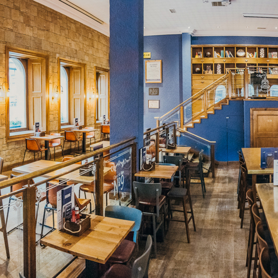 internal view of a restaurant with tables on several levels