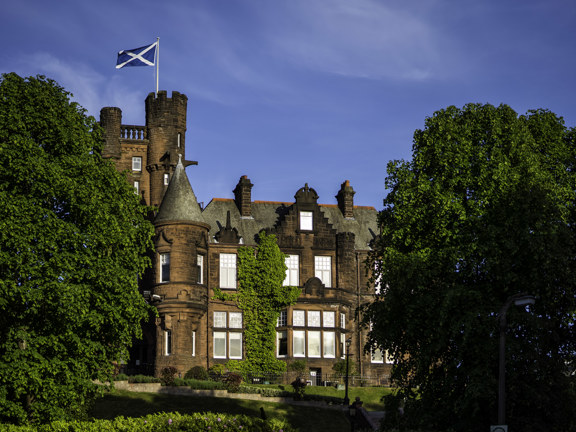 Red sandstone baronial castle style hotel building